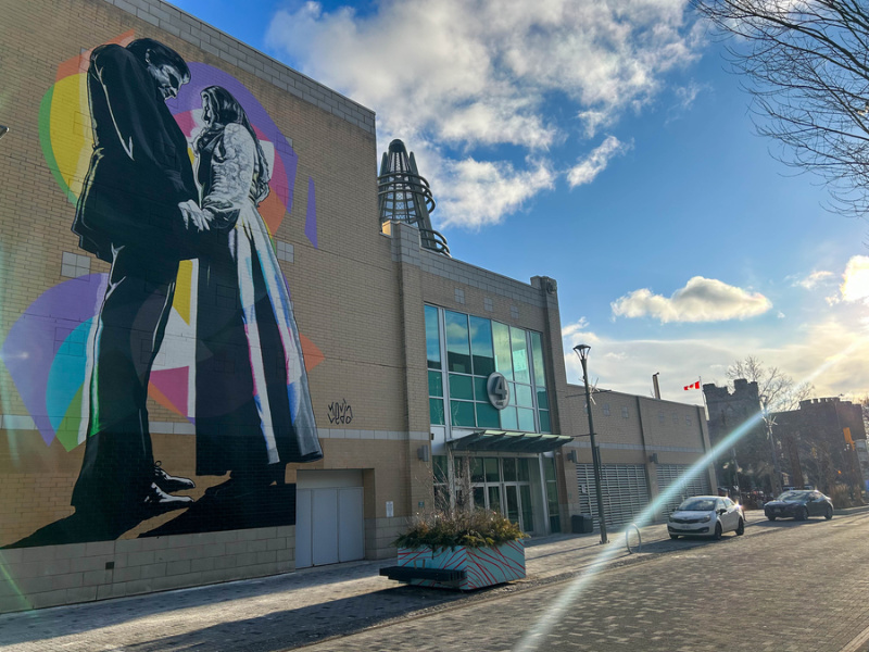 A three-story mural featuring Johnny Cash and June Carter on the north side of Budweiser Gardens