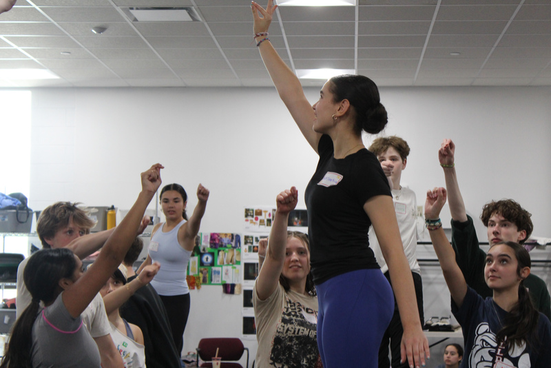 A group of students rehearses a scene for the 2024 High School Project, Matilda.
