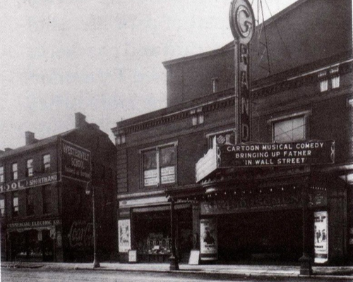 A black and white photograph from Richmond Street facing the front of the Grand Theatre in 1920.