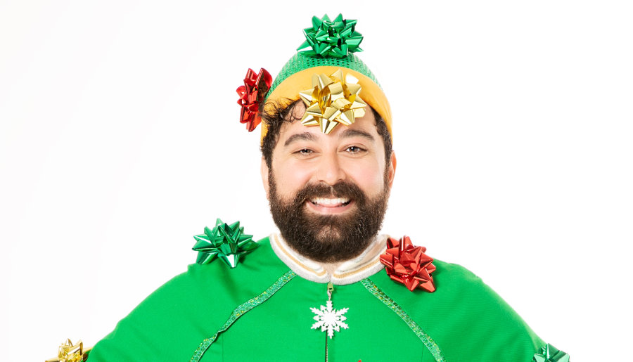Photo of Izad Etemadi, in costume as Buddy the Elf from Elf: The Musical.