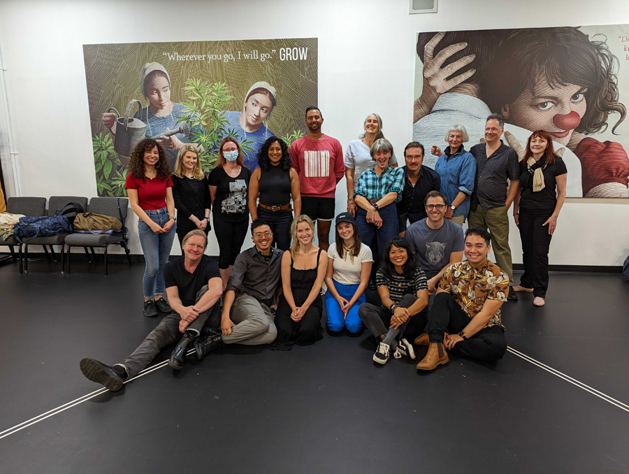 Trina Davies poses with members of the cast and creative team of 'Grand Ghosts' in the rehearsal hall.