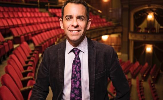 Dennis Garnhum stands in the balcony of the Grand Theatre's Spriet Stage