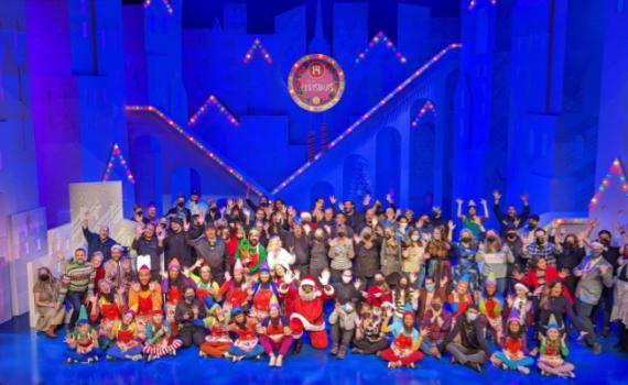 The cast (in costume), creative team and crew of Elf, along with Grand Theatre staff pose on the set of Elf on the Spriet Stage.