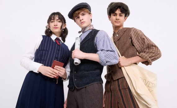 Katherine, Jack, and Davey pose for a worm’s eye view photo together.