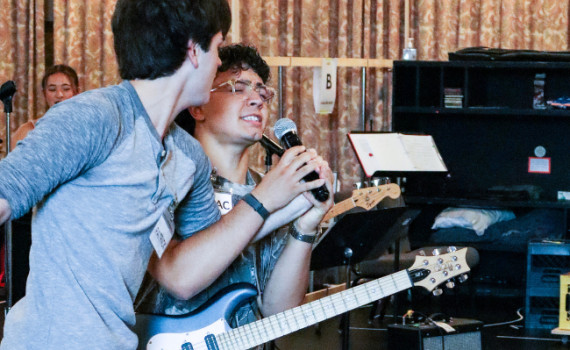 Isaac and Patrick at the mic during rehearsal.