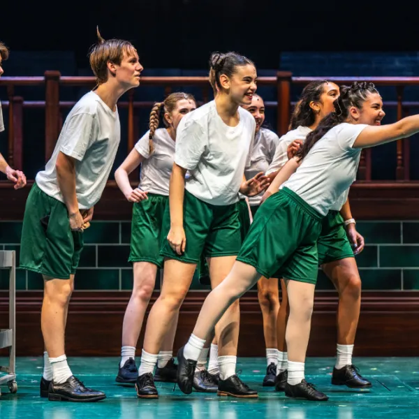 Pictured: The Company of MATILDA THE MUSICAL. Directed by: Megan Watson. Music Directed by: Sarah Richardson. Choreographed by: Stephen Cota. Set Design by: Scott Penner. Costume Design by: Lisa Wright. Lighting Design by: Jareth Li. Sound Design by: Aaron Ouellette. Photo by Dahlia Katz.