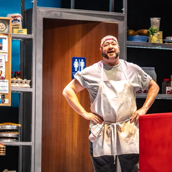Pictured: Lee Siegel. Director: Rachel Peake. Music Director: Patrick Bowman. Choreographer: Genny Sermonia. Set & Costume Designer: Scott Penner. Lighting Designer: Michelle Ramsay. Sound Designer: Richard Feren. Fight & Intimacy Director: Siobhan Richardson. Photo by Dahlia Katz.