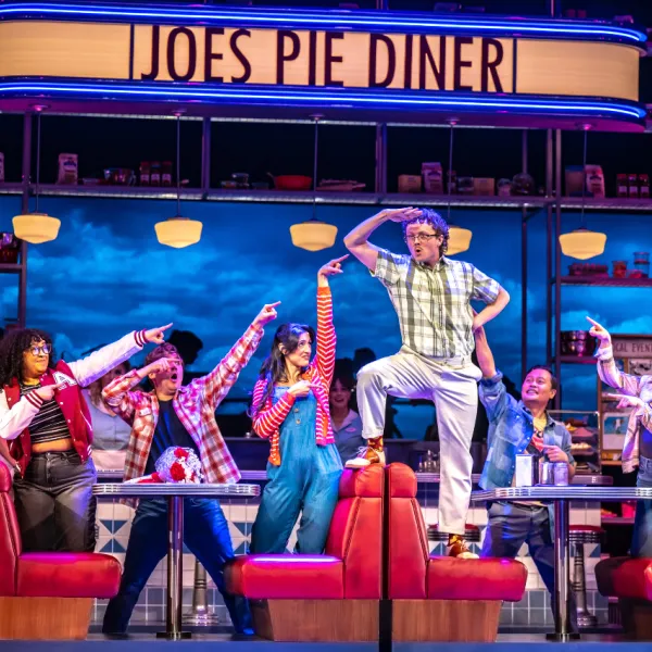 Pictured: THE COMPANY OF WAITRESS. Director: Rachel Peake. Music Director: Patrick Bowman. Choreographer: Genny Sermonia. Set & Costume Designer: Scott Penner. Lighting Designer: Michelle Ramsay. Sound Designer: Richard Feren. Fight & Intimacy Director: Siobhan Richardson. Photo by Dahlia Katz.