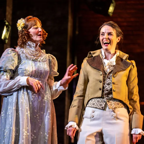 Pictured: Carmen Grant, Sarah Wilson. Directed by Rebecca Northan, Choreographed by Krista Leis, Set Design by Brandon Kleiman, Costume Design by Joanna Yu, Lighting Design by Sophie Tang, Sound Design by Maddie Bautista. Photo by Dahlia Katz.