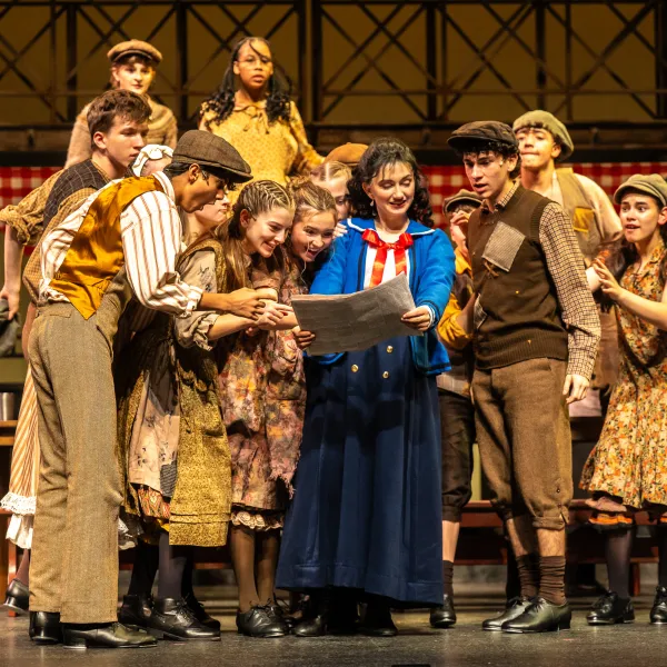 Pictured: Company members of Disney’s NEWSIES at the Grand Theatre. Directed by Ray Hogg. Music Direction by Matthew Atkins. Choreographed by Krista Leis. Set Design Consultant: Joshua Quinlan. Costume Design by Lisa Wright. Lighting Design by Echo Zhou周芷會. Sound Design by Emily Porter. Fight Director: Mike Dufays. Disability Consultant: Kristi Hansen. Stage Management by Melissa Cameron. Photography by Dahlia Katz.