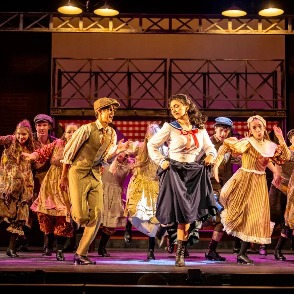 Pictured: Company members of Disney’s NEWSIES at the Grand Theatre. Directed by Ray Hogg. Music Direction by Matthew Atkins. Choreographed by Krista Leis. Set Design Consultant: Joshua Quinlan. Costume Design by Lisa Wright. Lighting Design by Echo Zhou周芷會. Sound Design by Emily Porter. Fight Director: Mike Dufays. Disability Consultant: Kristi Hansen. Stage Management by Melissa Cameron. Photography by Dahlia Katz.